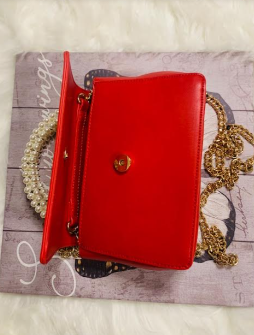 Gold Shoulder Handbag With Pearl Handle In Red